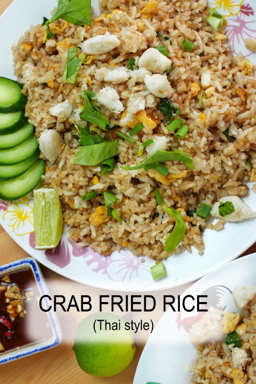 Crab fried rice Thai style  ข้าวผัดปู, a delicious quick meal with fish sauce, crab meat, and high heat to create the wok aroma.