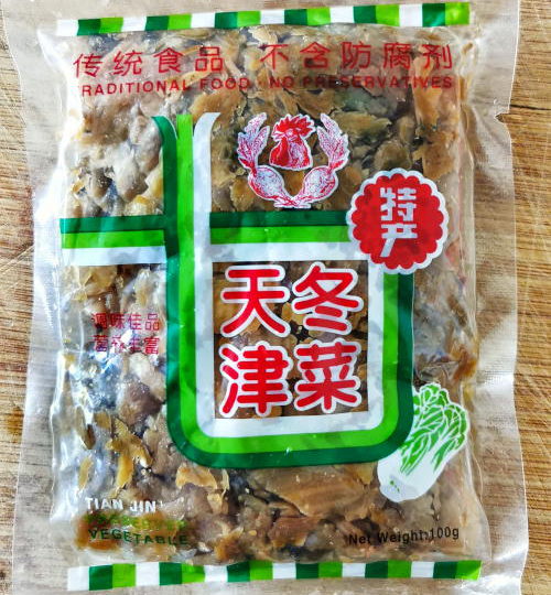 The words 天津冬菜 on the packaging means Tianjin preserved vegetables.  Besides that, it is also called Tianjin winter vegetables, ‘tung tsai 冬菜, or Tianjin preserved cabbage.  It is a type of pickled Chinese cabbage originating in Tianjin, China. It is also suitable for stir-fries, stewed dishes, and topping to flavor soups.
