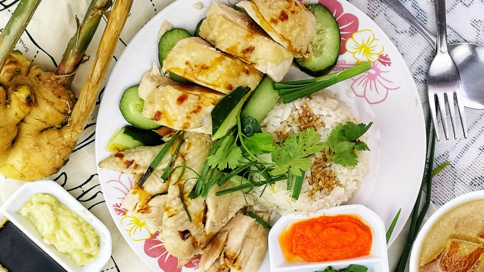 Hainanese chicken rice 海南鸡饭 is the Malaysian/Singapore adaptation of the Wenchang chicken from Hainan province of China.