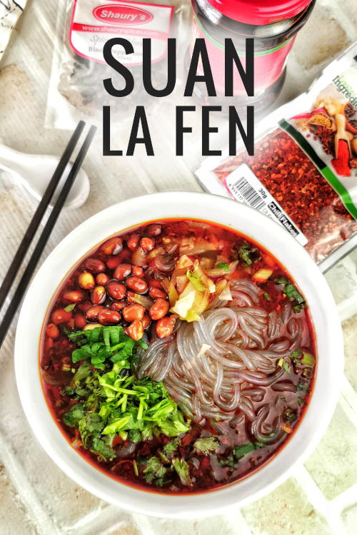 Suan la fen (酸辣粉) is typical street food with all the characteristics of Szechuan food. 
The sauce is made with Szechuan peppercorns, chili flakes, Chinkiang vinegar, and chili oil. Besides the essential ingredients, you can add minced pork, beef stew, and braised pork intestine.
