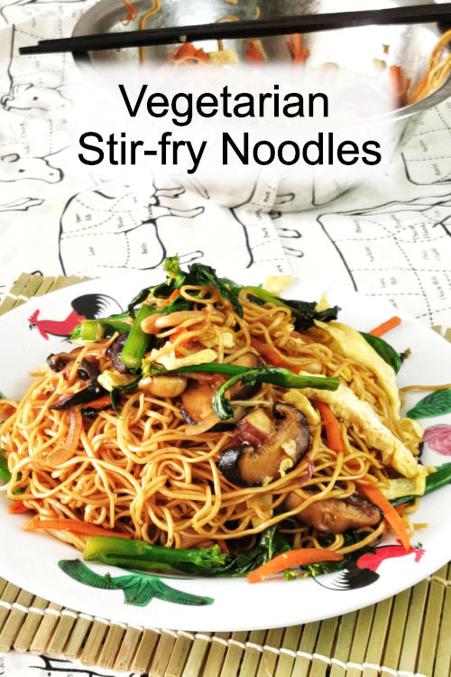 Vegetable stir-fry noodles with mushrooms Cantonese style. Pan-fry the noodles is the secret to the extra aroma.